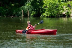 A youth canoes at Beech Fork State Park.