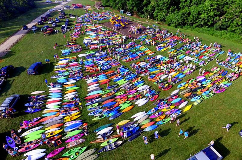 Kayaks await the annual Tour de Coal near the Upper Falls on the Coal River.