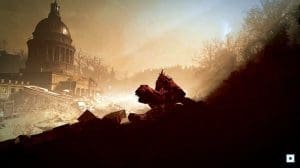 The golden dome of the W.Va. Capitol overlooks a ruined landscape.