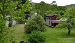 The ghost town of Bemis makes its appearance from a passenger train.