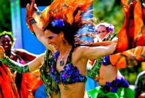 A dancer springs through a crowd at Culturefest, celebrated annually near Pipestem, West Virginia.
