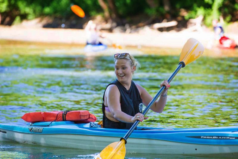 A kayaker paddles the Coal River Water Trail.