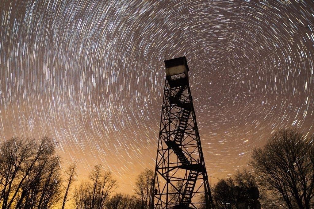 The Mann Mountain Firetower rises into the night sky on Chestnut Knob.