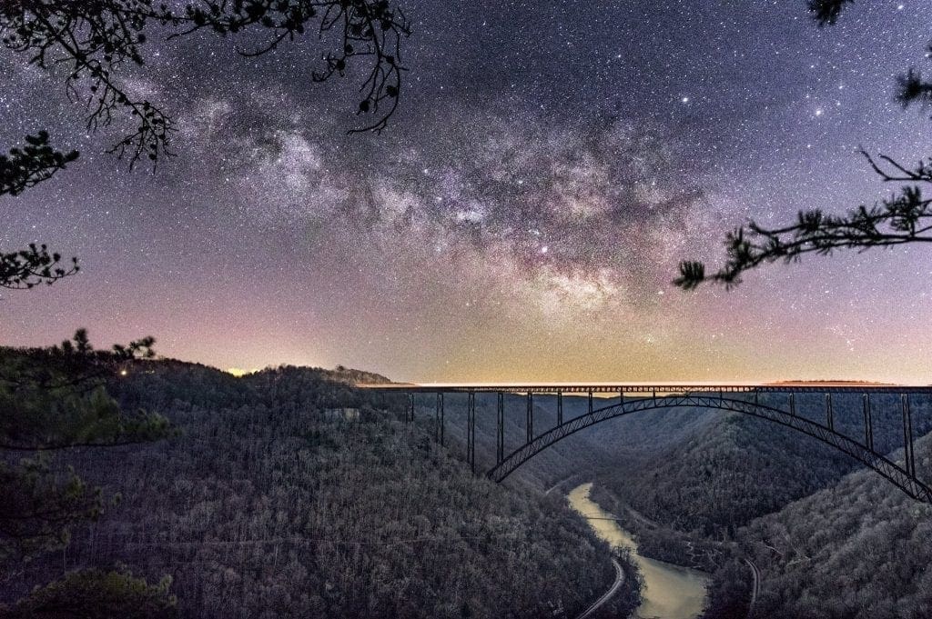 Headlights travel across the New River Gorge Bridge at Fayetteville.