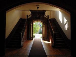 A staircase rises into the central tower at Old Main at Bethany College.