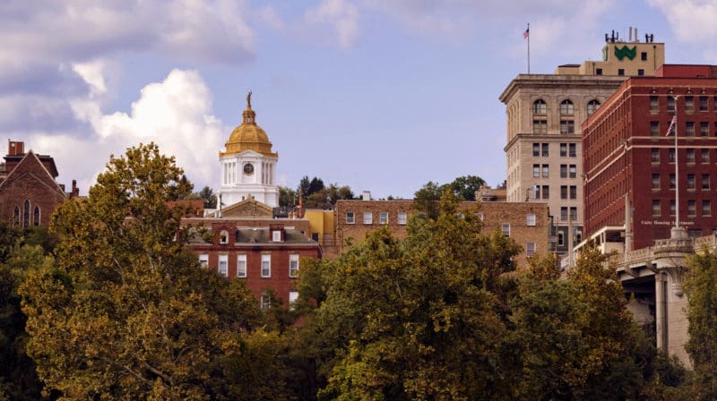 Fairmont West Virginia by Ben Amend The Marion County Courthouse rises above the Monongahela River treeline in Fairmont, West Virginia (WV). Photo by Ben Amend. Courtesy of the Convention and Visitors Bureau of Marion County.