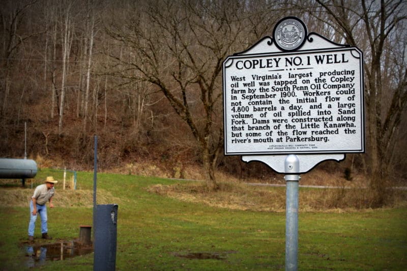 David Sibray explores the capped Copley Oil Well near Weston, West Virginia.