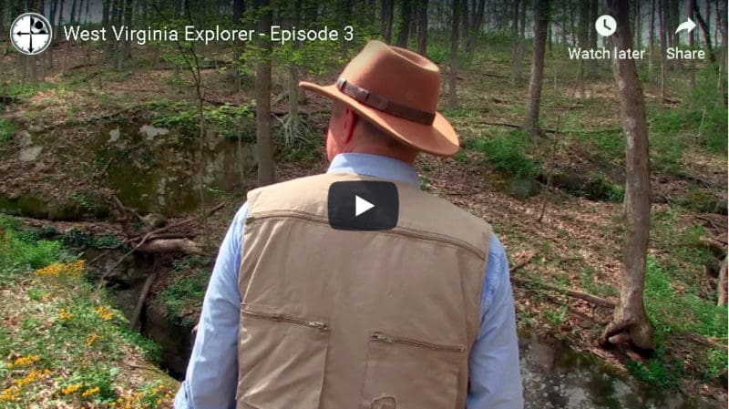 David Sibray explores a natural bridge in Roane County.