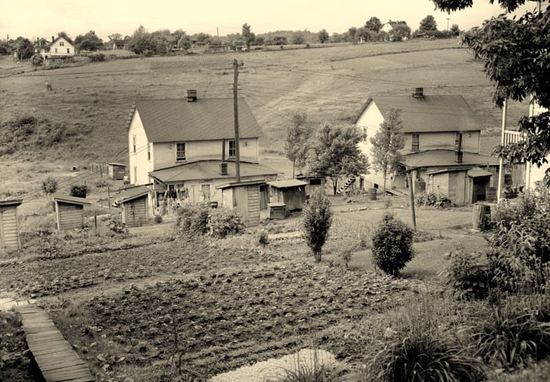 Company houses and backyard gardens climb the hillsides at Grant Town in northern West Virginia.