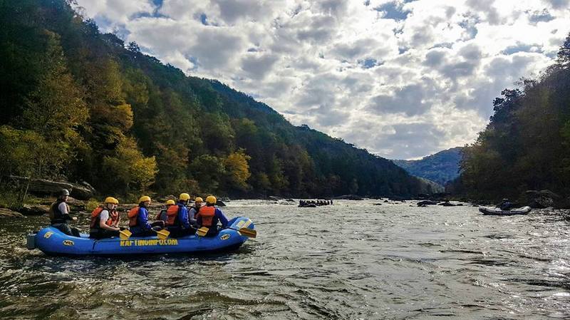 A raft launches into the Gauley River during an exciting excursion with River Expeditions.