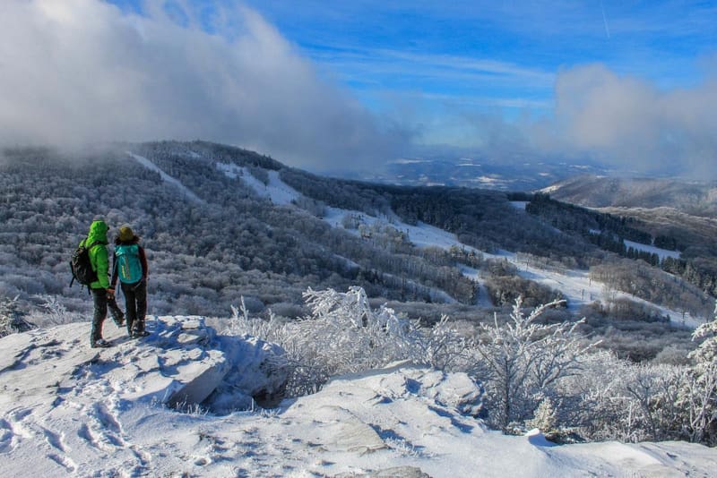 Hikers on Bald Knob survey they ski area at Canaan Valley Resort State Park.