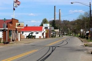 Commercial buildings line Fifth Street in New Haven, WV (West Virginia).