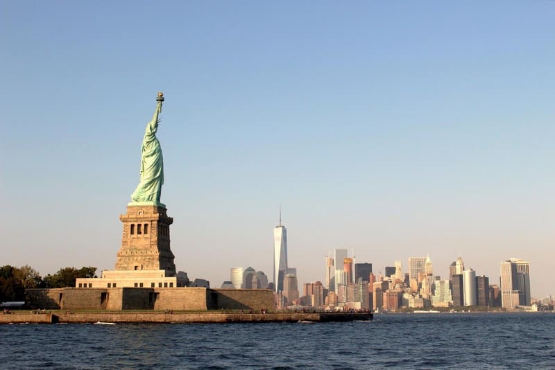 The Statue of Liberty overlooks New York Harbor in New York City.