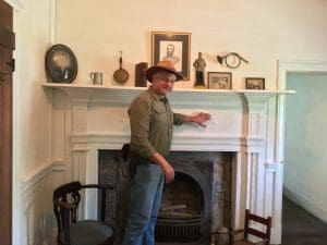 A possible sword mark scars a mantlepiece, likely carved during the tavern's occupation during the Civil War, according to earlier historians.