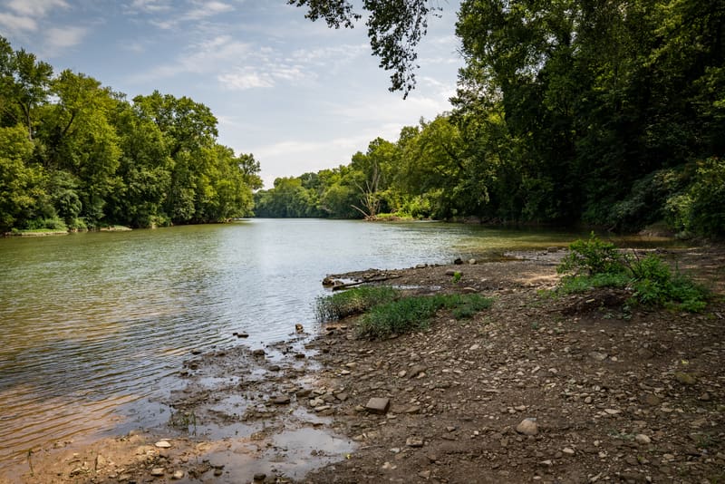 The Elk River flows past Big Chimney eat miles above its mouth at Charleston.