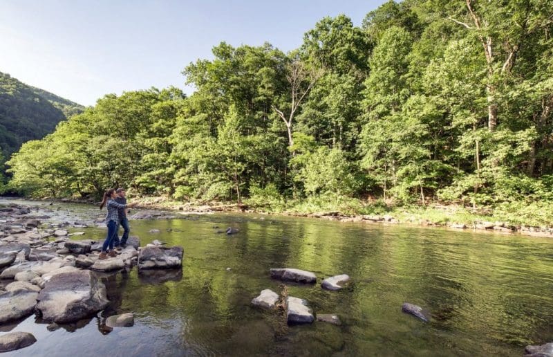 Park guests fish the Bluestone River at Pipestem Resort State Park