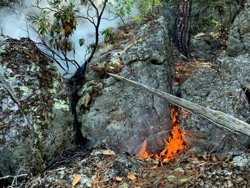 Fire travels through a boulderfield in Pendeleton County. (Photo courtesy W.Va. Dept. of Commerce)