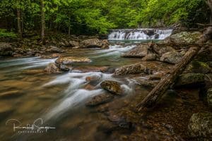 The largest falls on Glade Creek in the New River Gorge is roughly a mile upstream of its mouth.
