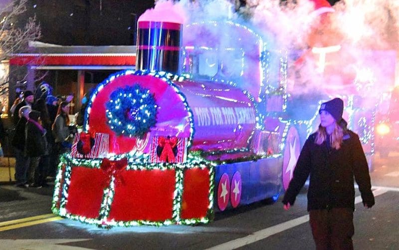 The Toys-for-Tots Train steams through the streets of Ripley during its annual Christmas parade.