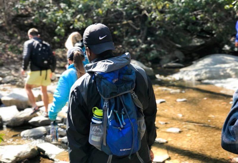 Hikers In Creek in West Virginia