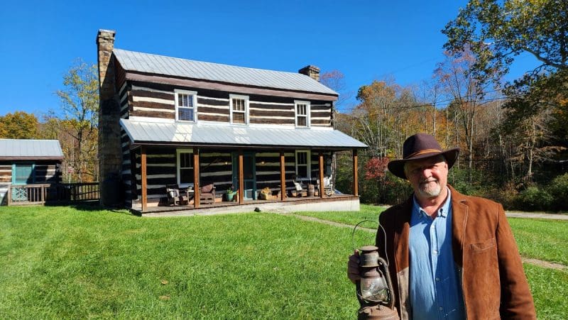 David Sibray Holds An Antique Lantern At The Covey House