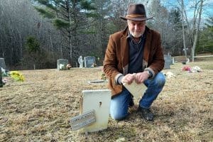 Sibray At Grave Of Likker Charlie Mills in West Virginia