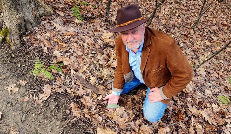 David Sibray Examines Single Leafed Orchid in West Virginia