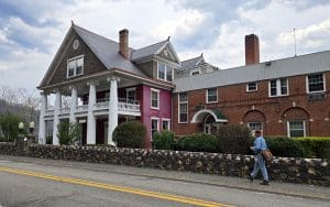 The Glen Ferris Inn on US-60 stands across the river from VanBibber's Rock.