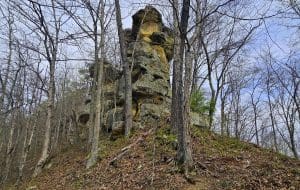 The Devil's Tea Table at Burning Springs, West Virginia, rises above a hillside along the Little Kanawha River.