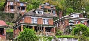 Brick homes climb the steep hillsides that ascend the valley of Elkhorn Creek at Keystone, West Virginia.