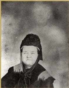 A 1857 "ghost photograph" depicts a spirit posing behind the sitter.