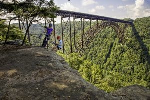 Climbers explore the New River Gorge National Park, a 30 minute drive from downtown.