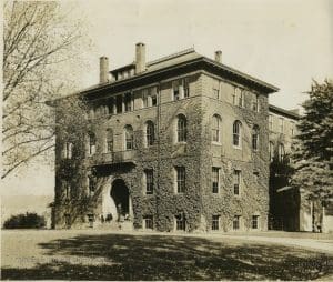 Ivy-covered Chitwood Hall flanks Woodburn Circle on the north.