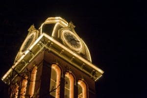 The clock tower on Woodburn Hall, the tallest of four towers that encircle the building, is perhaps the most widely recognized image of the university.