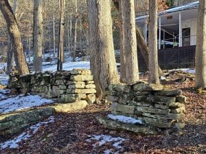Several hand-crafted stone walls remain in the historic district.