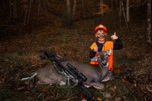 Judah Brooks, of Cool Ridge, W.Va., poses with a trophy buck.