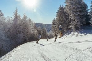 Skiers on a sunny morning at Snowshoe Mountain Resort. (Photo courtesy Snowshoe Mountain Resort)